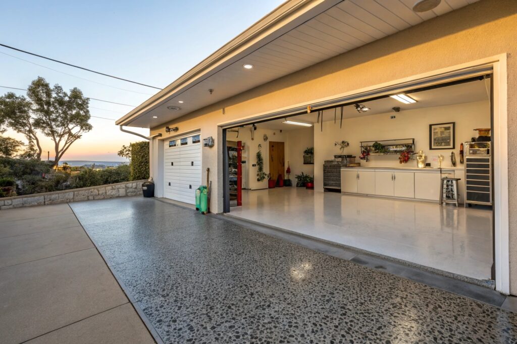 Well-maintained epoxy garage floor with decorative flake finish in coastal California home